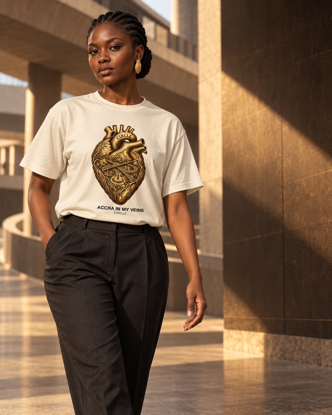 Model wearing the Circle edition in Museum Bone on an Accra street